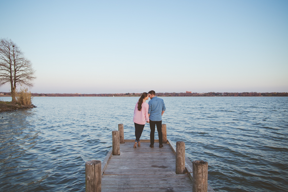 engaged couple on the dock