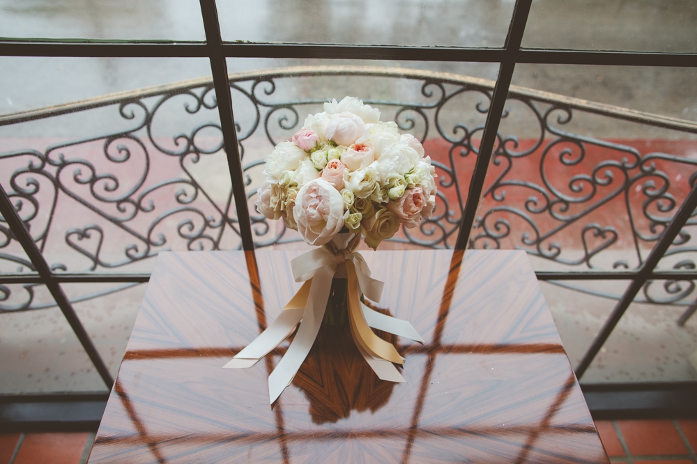Bride's Bouquet on Reflective Table at St. Anthony Hotel