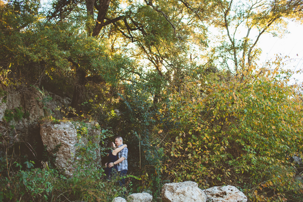Couple kissing in the trees