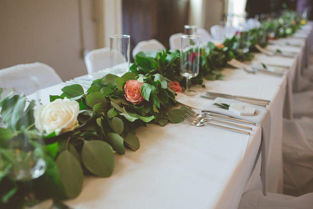 lush florals on head table