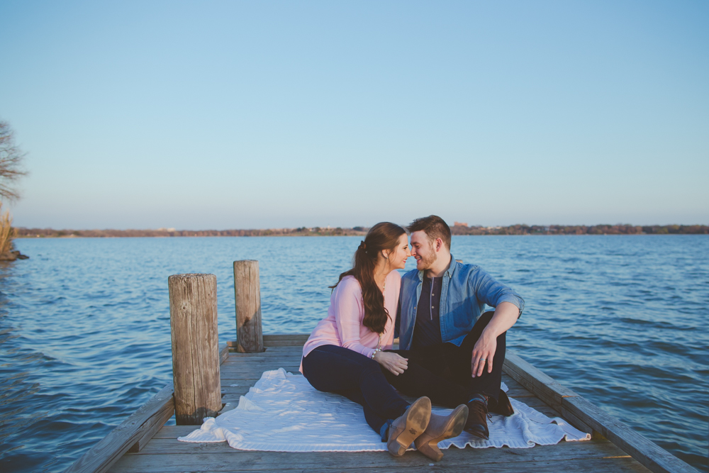 engaged couple on the dock