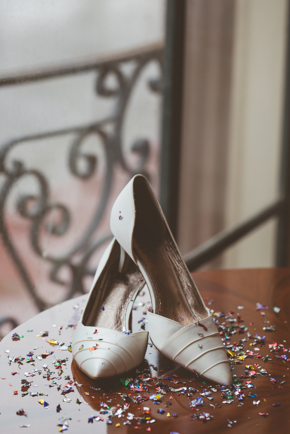 Bride's Shoes with Confetti at St. anthony Hotel
