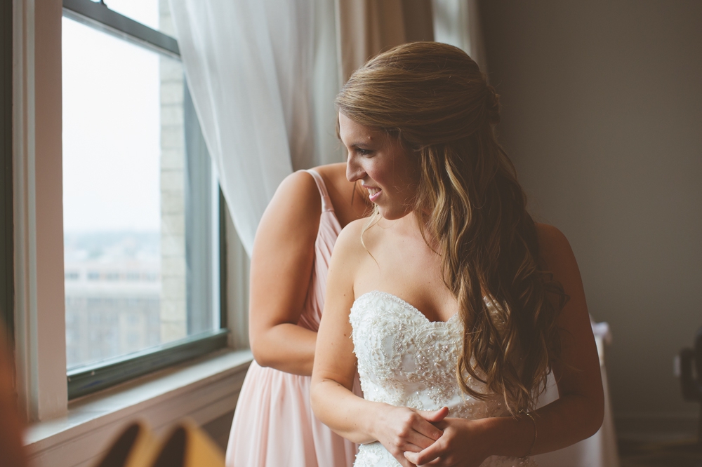 Bride Looking Out the Window at St. Anthony Hotel