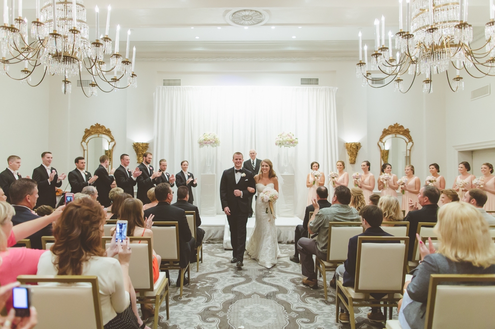 bride and groom recessional St. Anthony Hotel