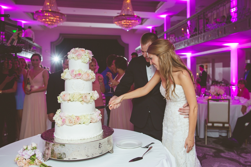 Bride and Groom Cut four tier cake