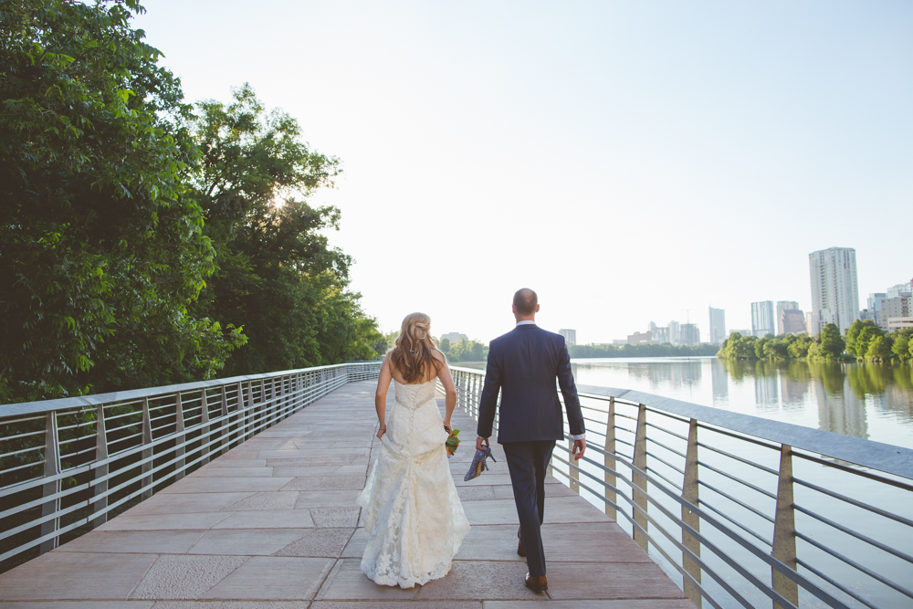 bride and groom on austin boardwalk