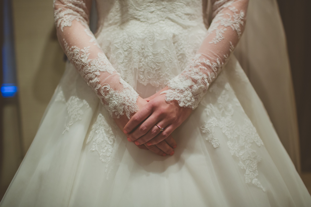 bride's hands clasped