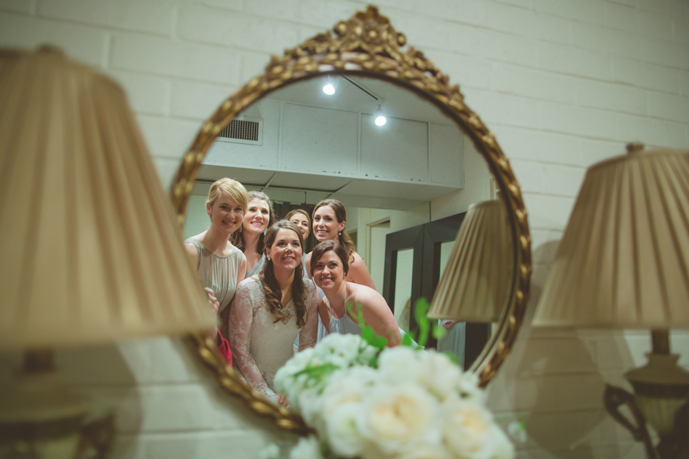 bridal party reflection in the mirror