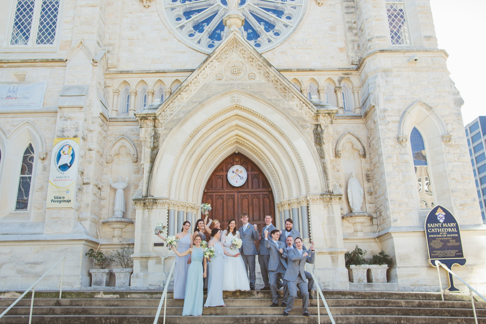bridal party on the steps of st. mary's cathedral