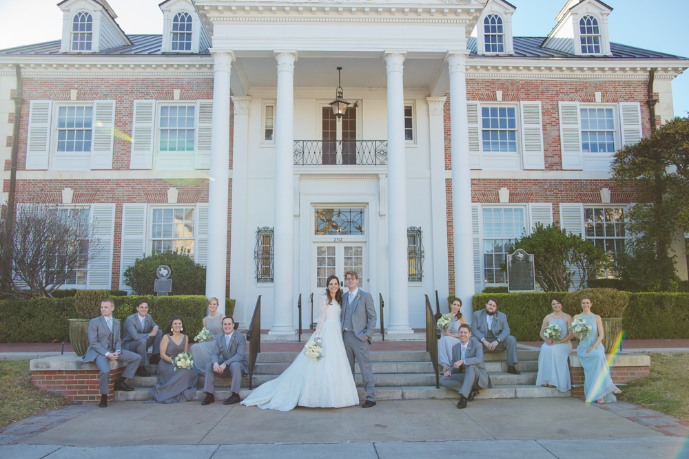 bridal party in front of TFWC mansion