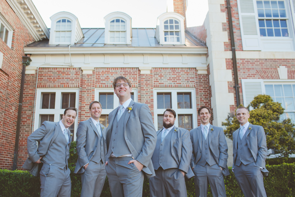groom and groomsmen in front of tfwc mansion