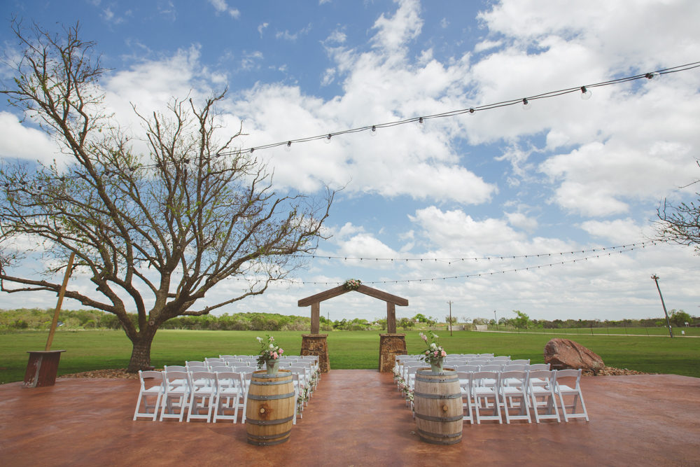 ceremony site with wine barrels