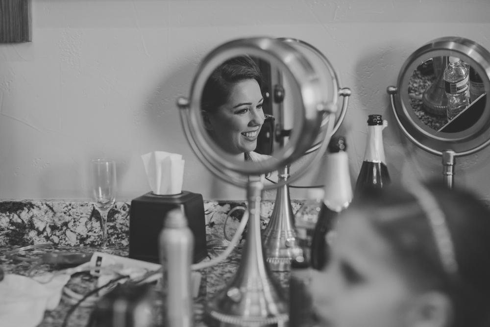 bride's reflection in mirror