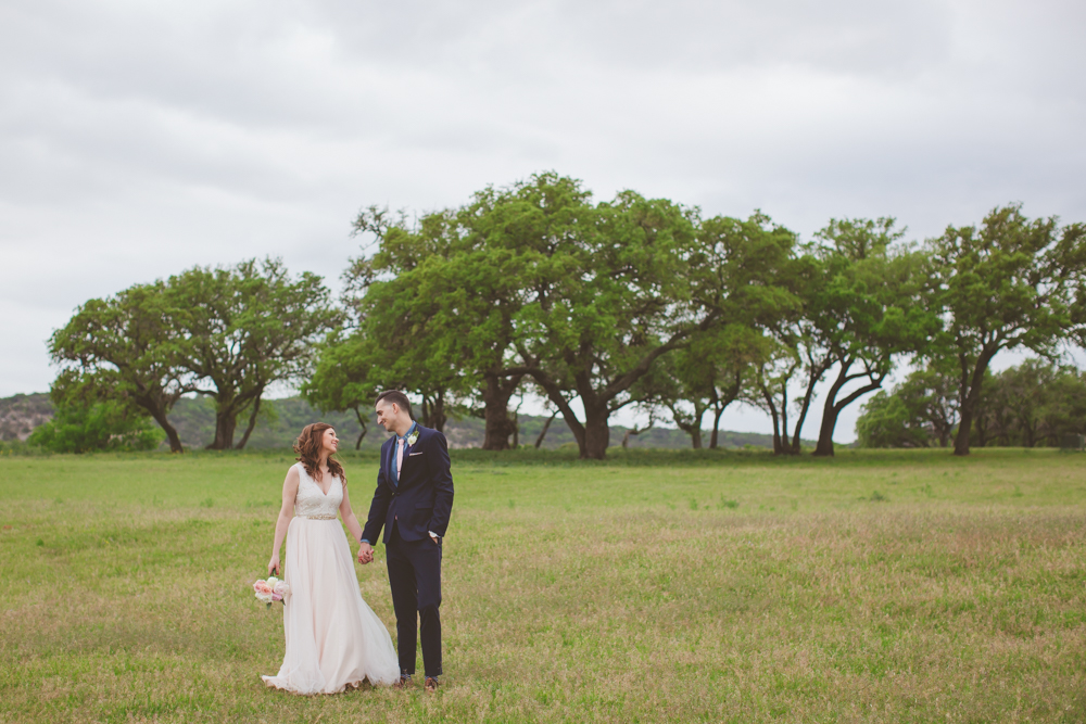 bride and groom in the field