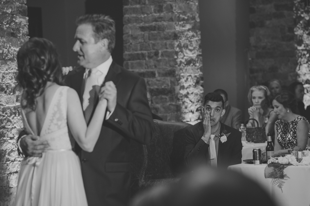 groom crying during father daughter dance