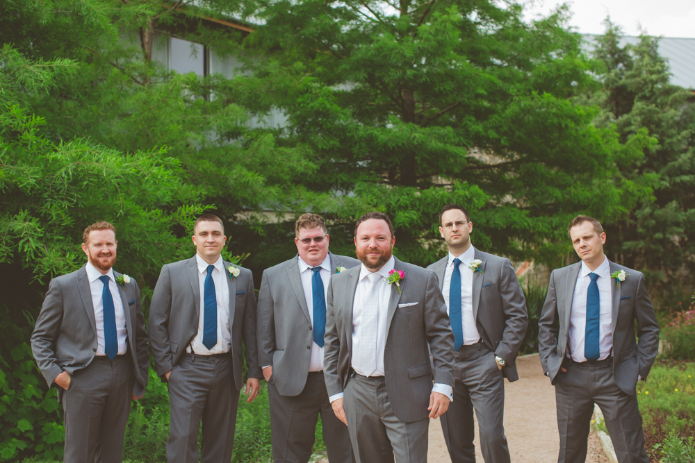 groom and groomsmen with blue ties
