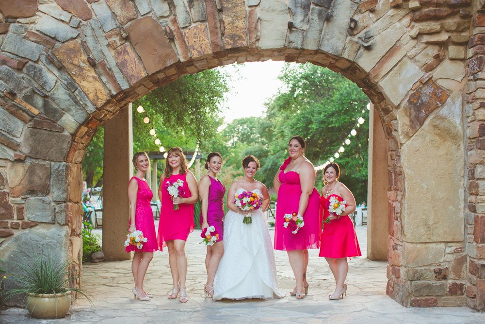 bride with pink bridesmaids