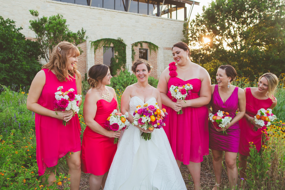bridesmaids with shades of pink dresses