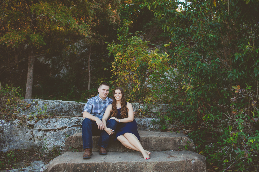 couple sitting on a rock