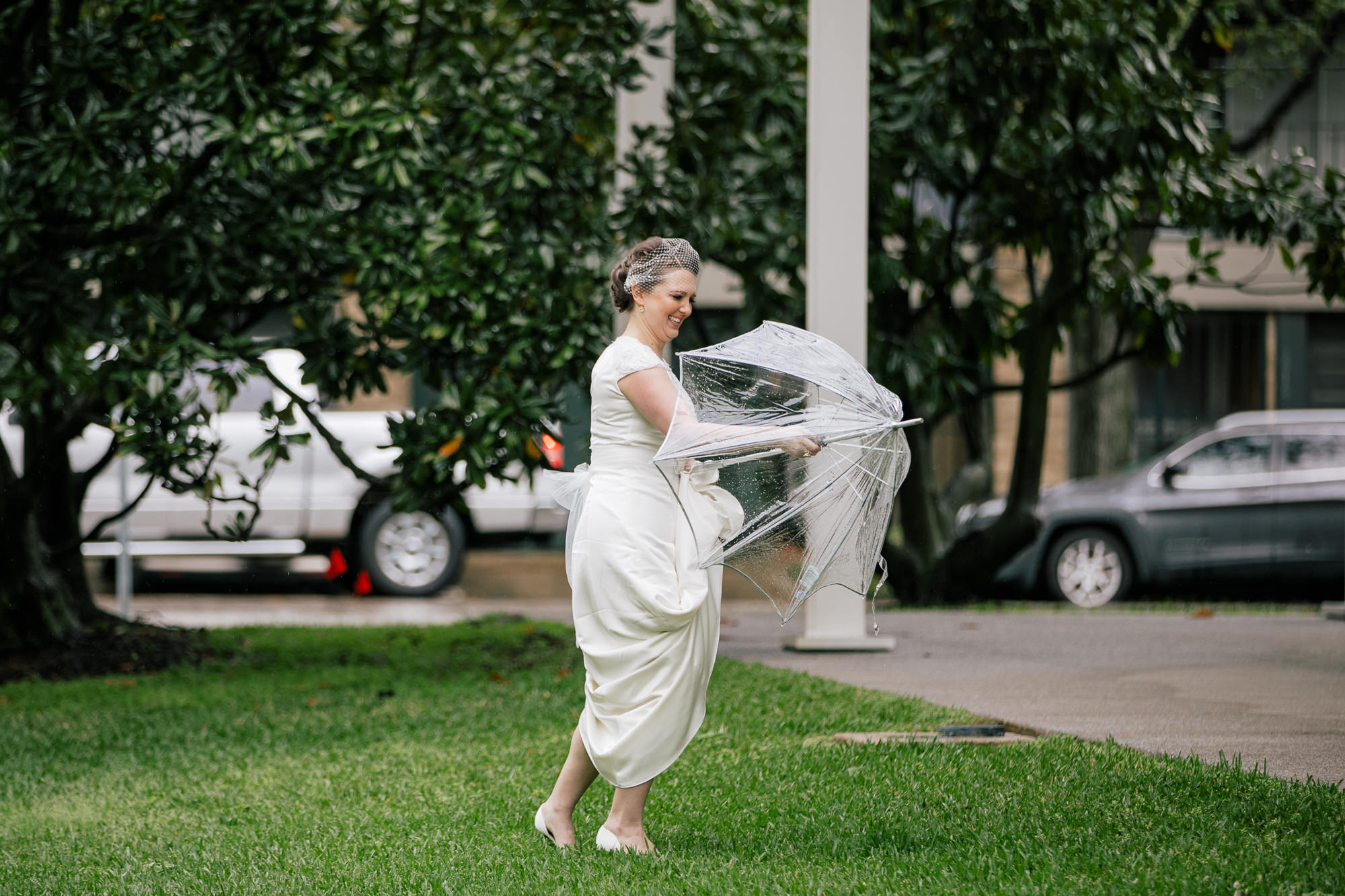 bride with clear umbrella