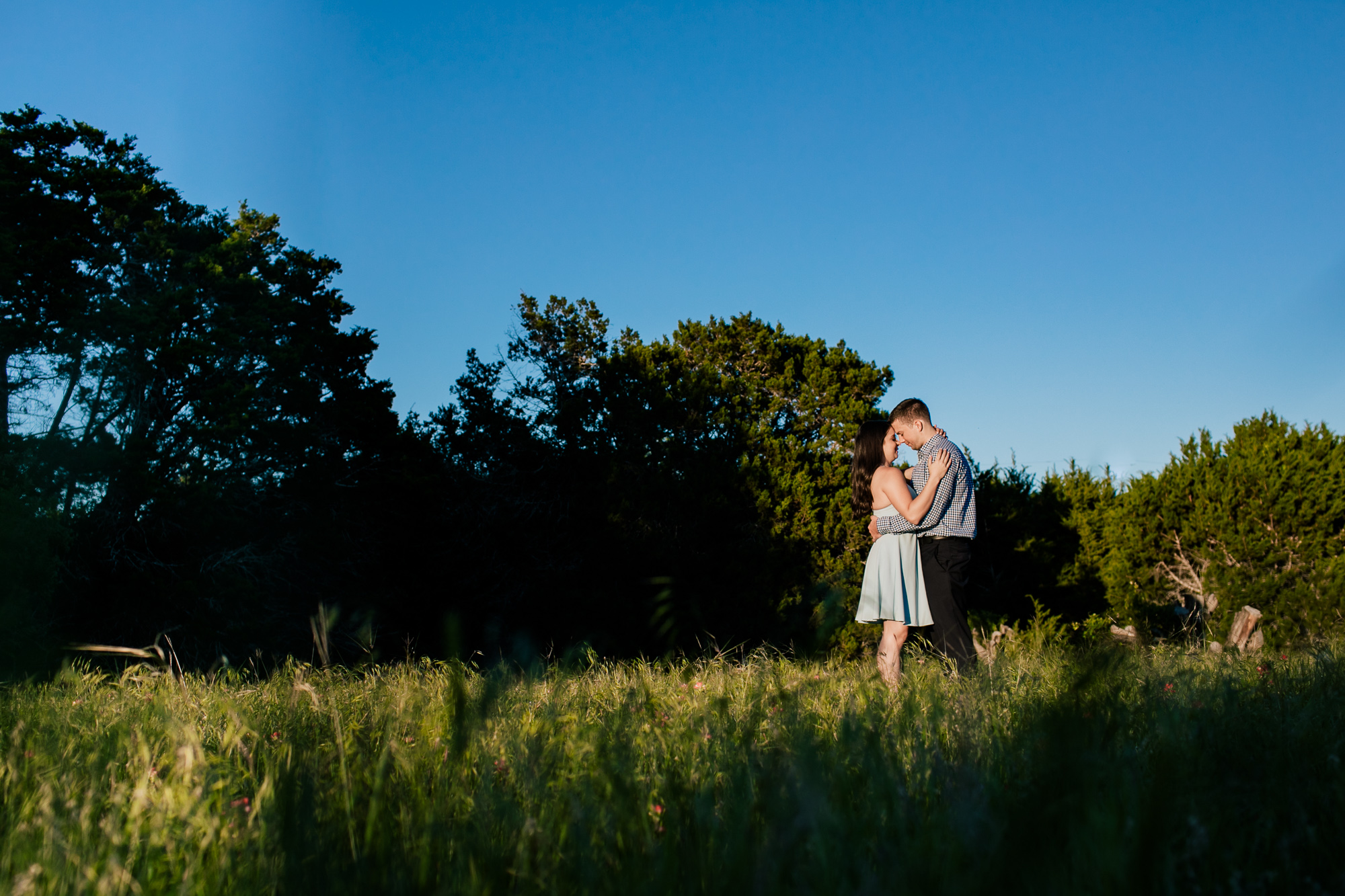 couple standing in a field