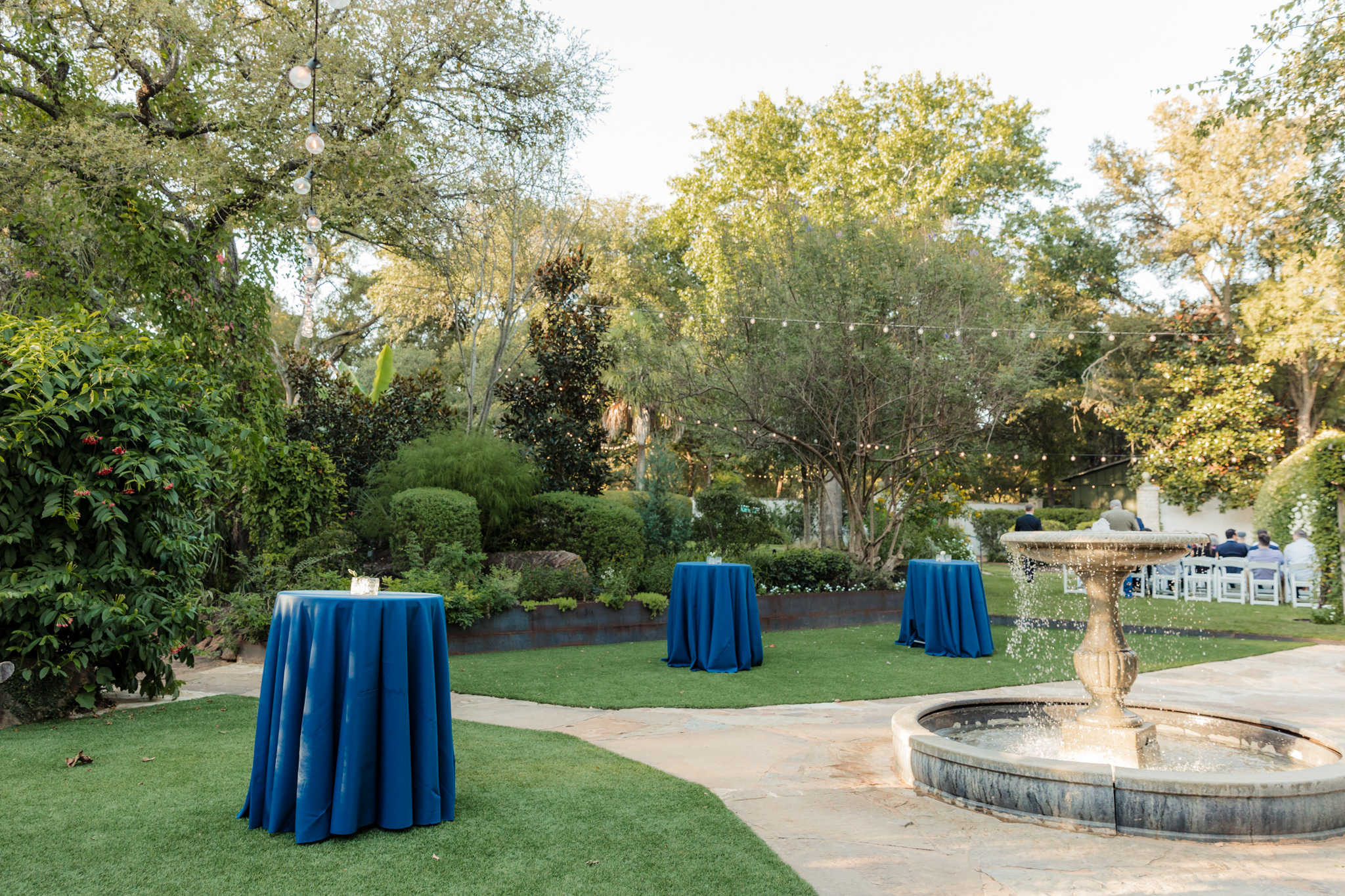 cocktail hour tables with blue cloths