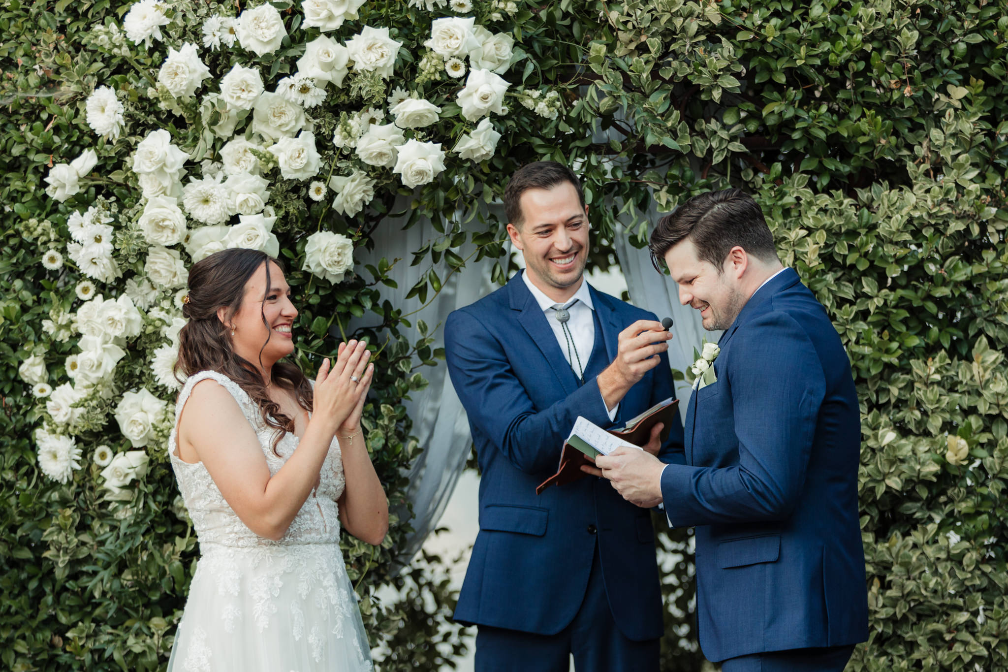 bride and groom exchanging vows