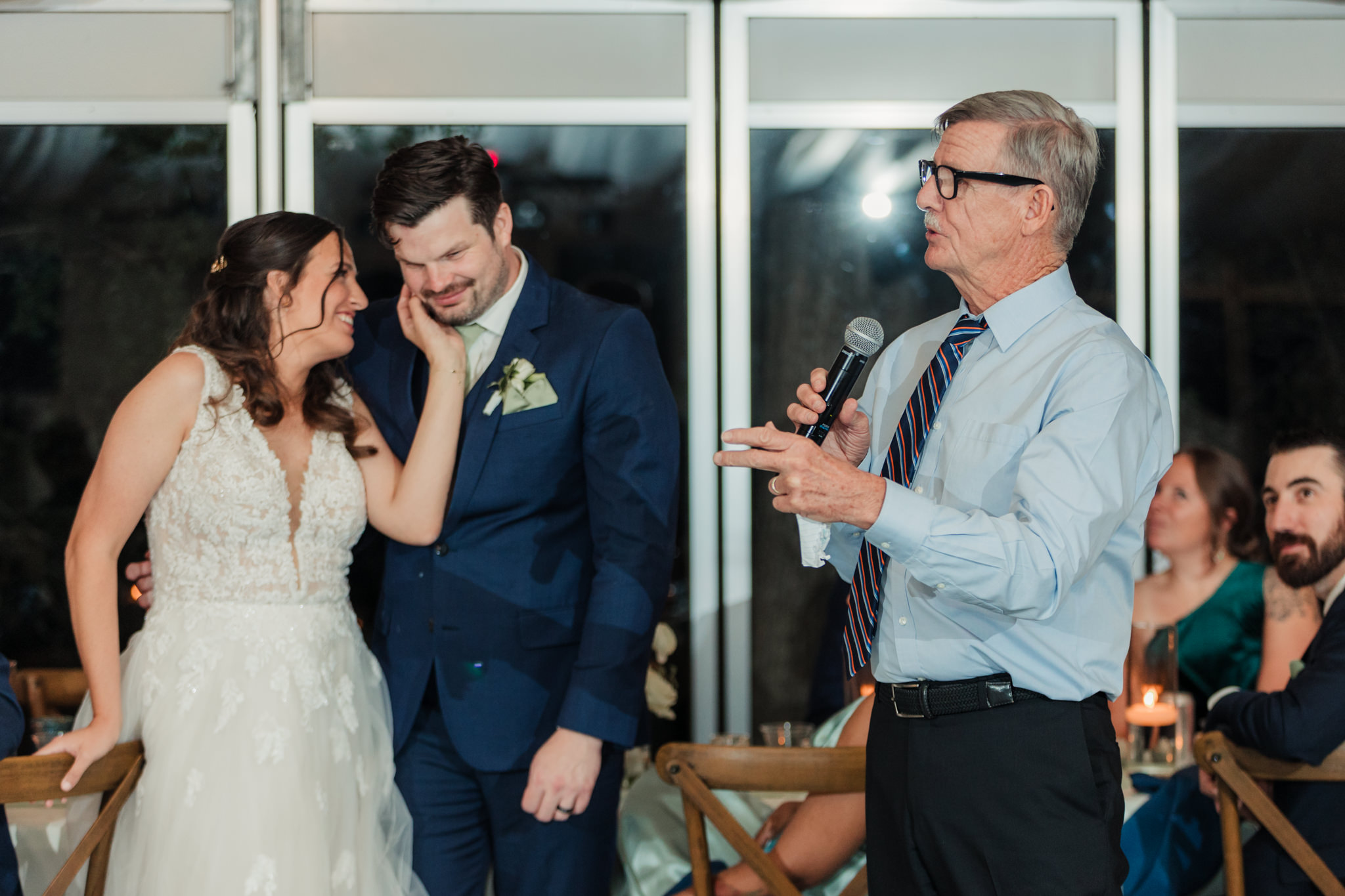 couple embracing during father of the bride speech