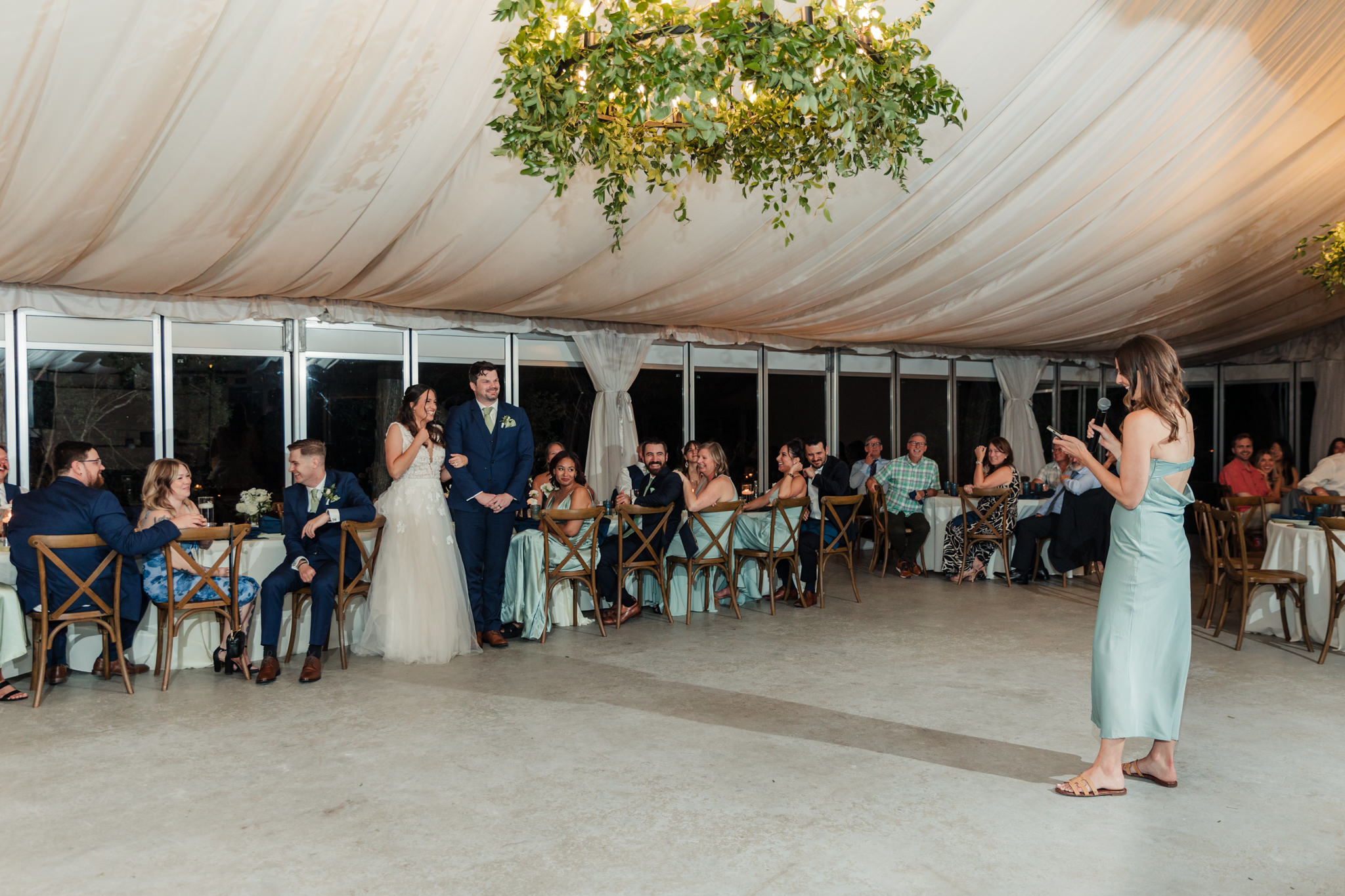 wide shot of reception during toasts