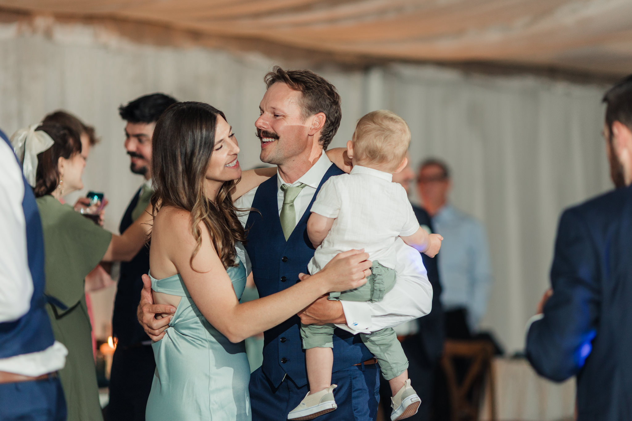 family dancing at reception