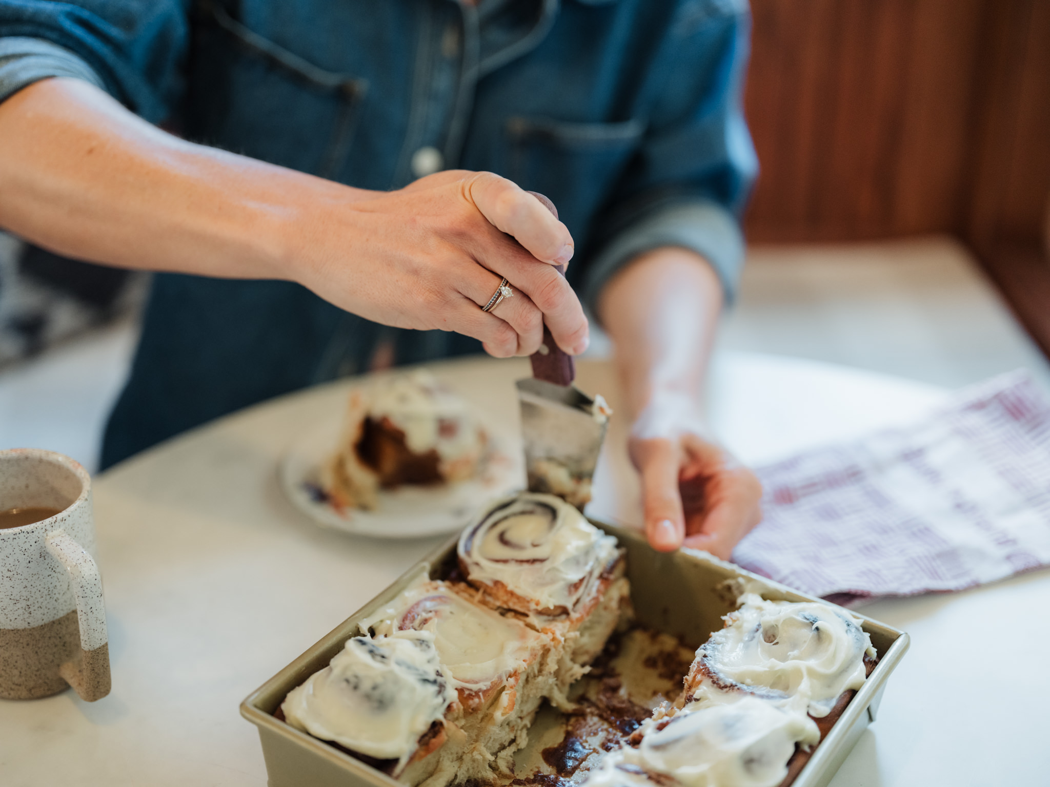Joy the Baker maternity serving cinnamon rolls