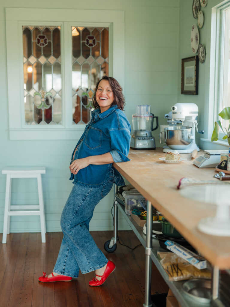 Joy the Baker maternity in her kitchen